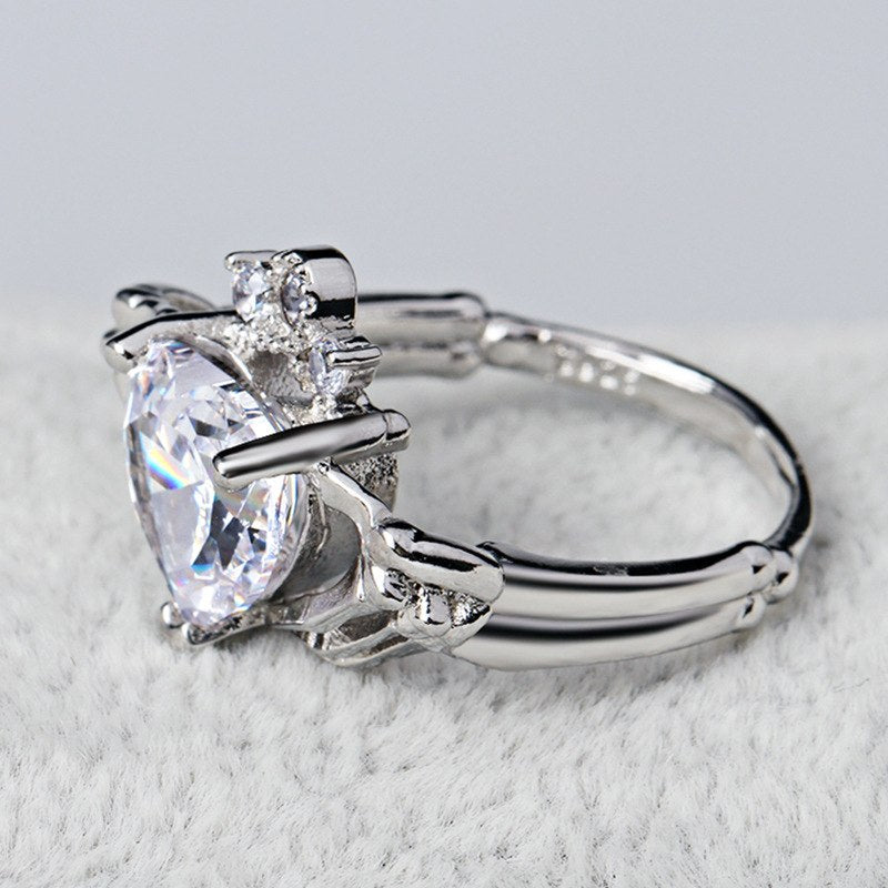 Skeleton Hands Holding Heart Claddagh Ring