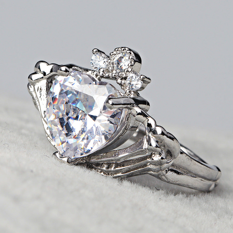 Skeleton Hands Holding Heart Claddagh Ring